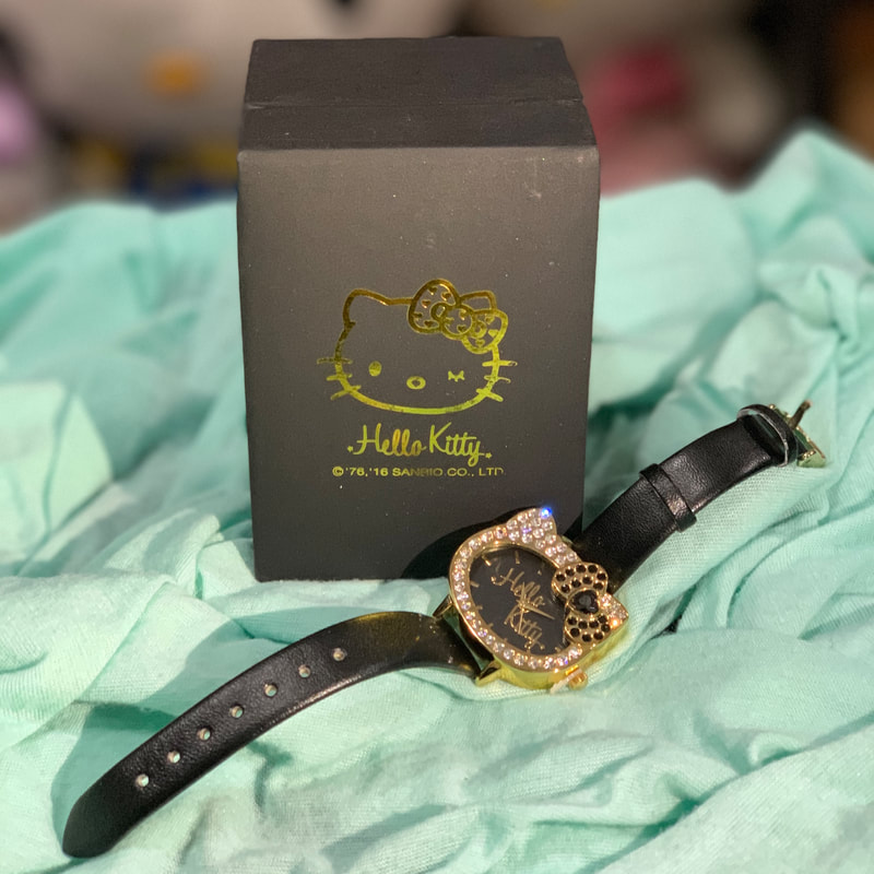 reloj de Hello Kitty con caja